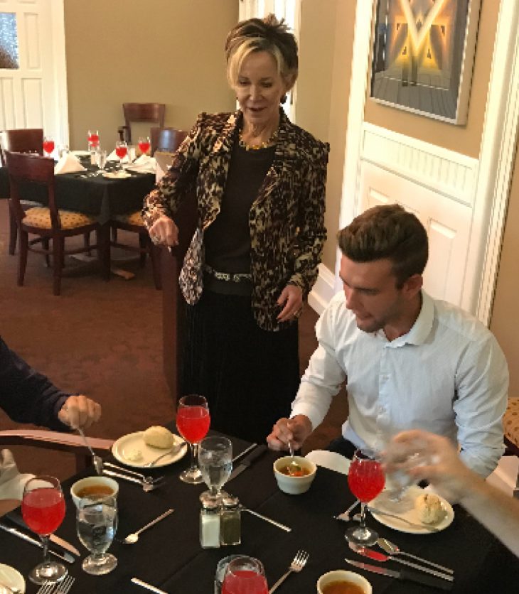 Dr. Jahnae Barnett with Students at Etiquette Dinner