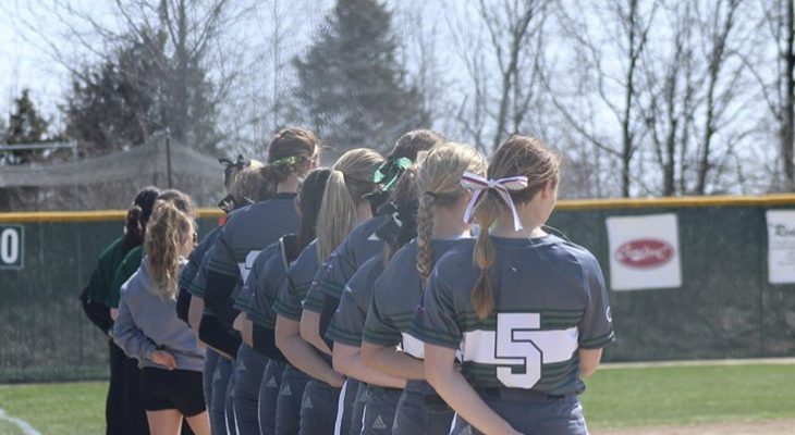 Softball team posed in a line