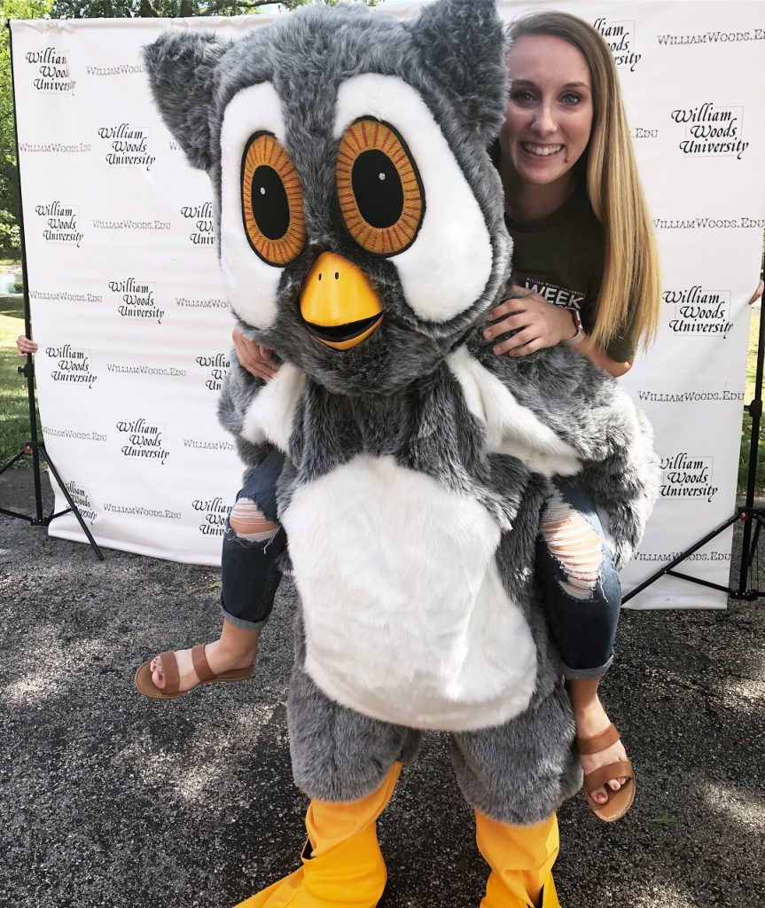 Ari Arnold with the Screech mascot