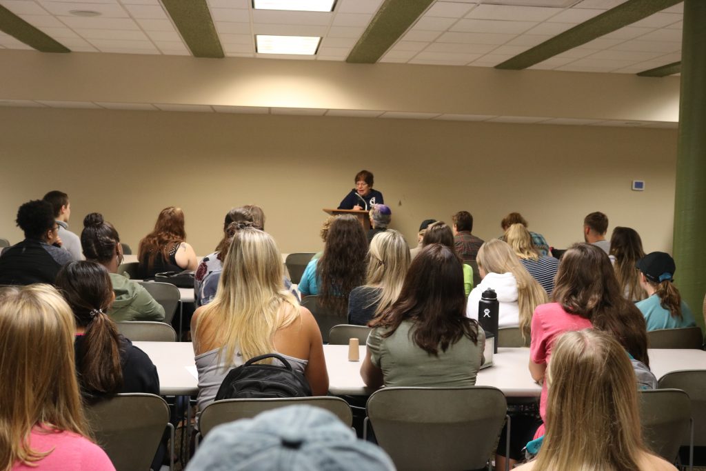 A RESPECT speaker talking to a room of students