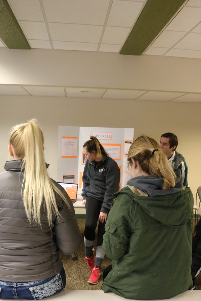 Students at a posterboard presentation