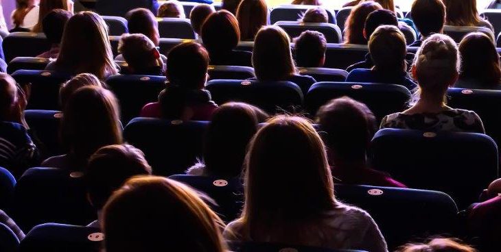 People in a theatre