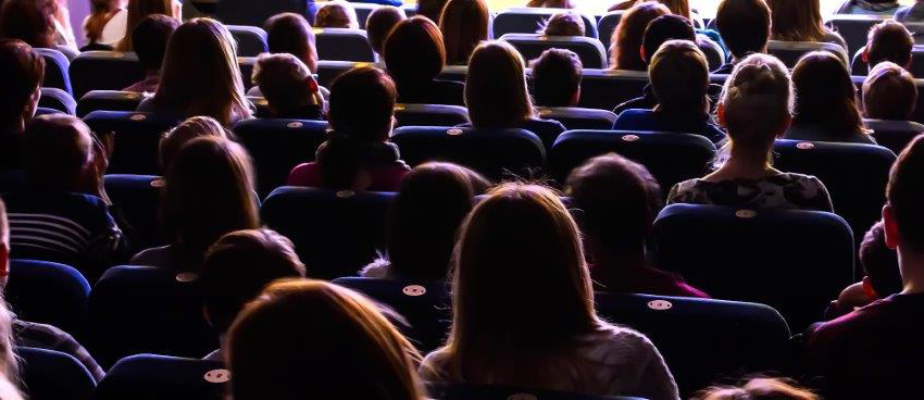 People in a theatre