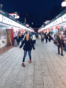 Megan Brown in busy japanese street