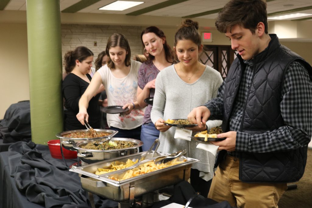 Students lining up to get exotic cuisine