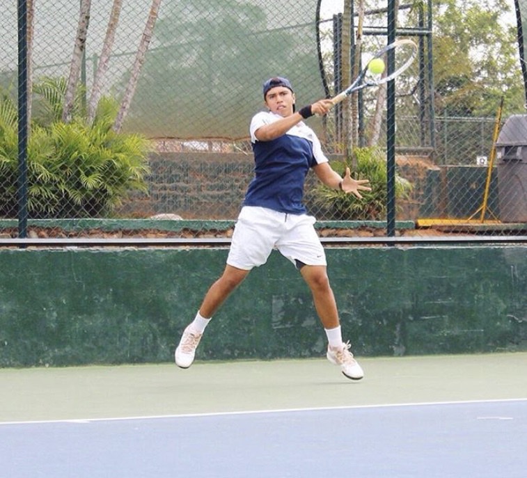 Juan Duran playing tennis