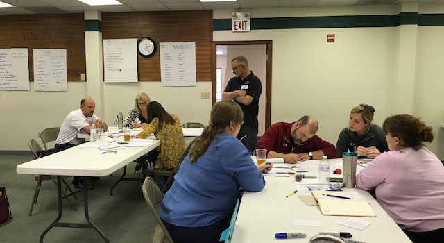 Staff and faculty learning about mental health