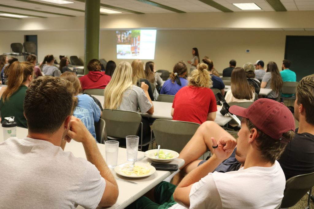 Caitlin Cook teaching other students at a LEAD event. 