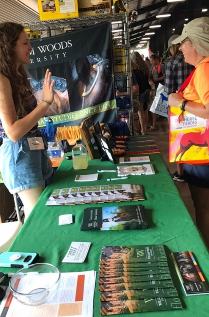 Talking to students at a college fair