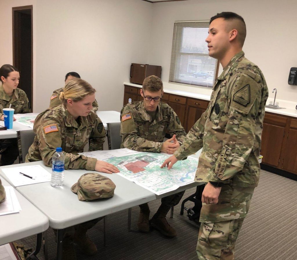 Photo of CPT Brett Kirk instructing students 