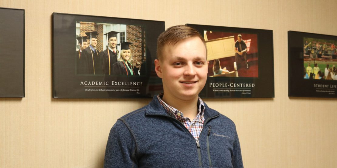 Photo of Ethan Schroyer in the Burton Business Building