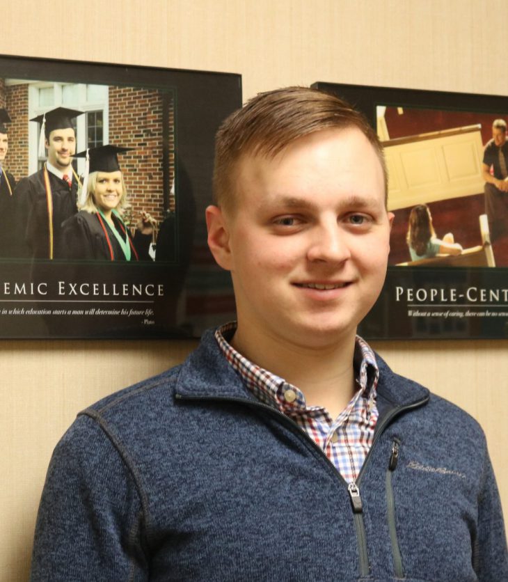 Photo of Ethan Schroyer in the Burton Business Building