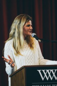 Photo of Kristina Baum at the podium