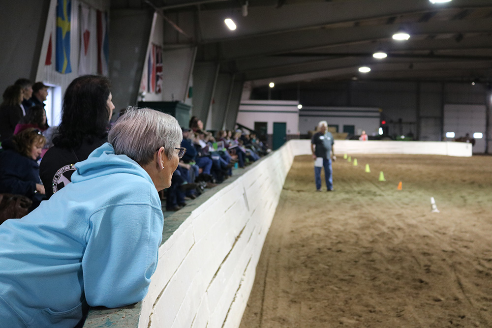 Photo of a crowd listening to a judge at the clinic