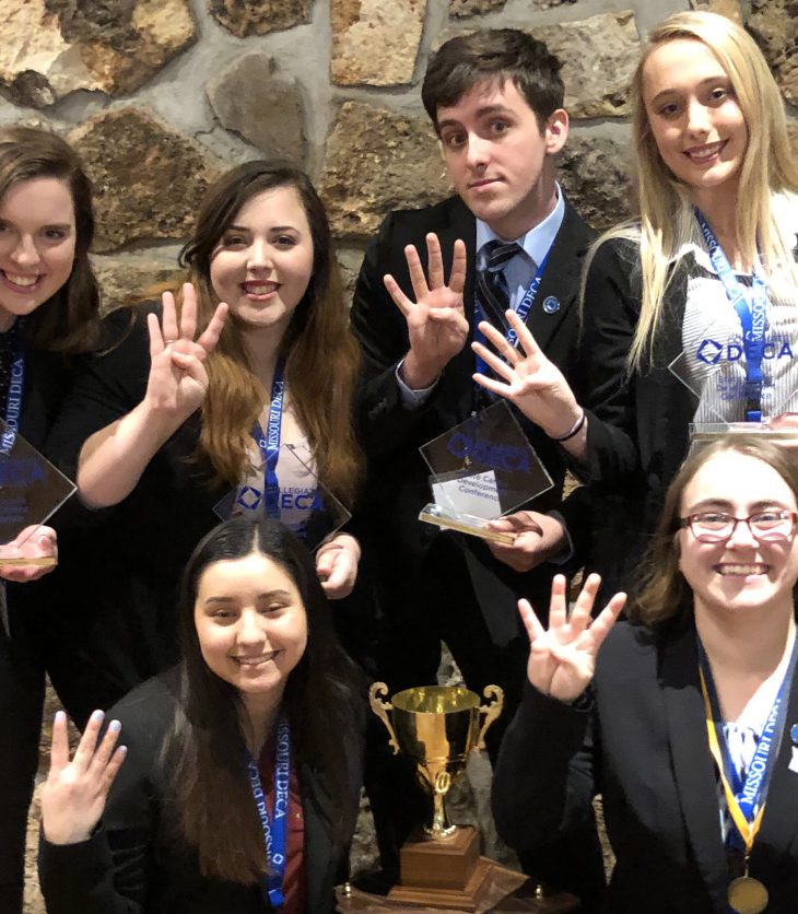 In photo First row, left to right: Stephanie Almazan ’23 and Nina McKee ‘19 Back row, left to right: Jade Schmedding ’22, Mary Aguado ’22, Ben Schmiemeier ’21, Elizabeth Tamborski ‘22