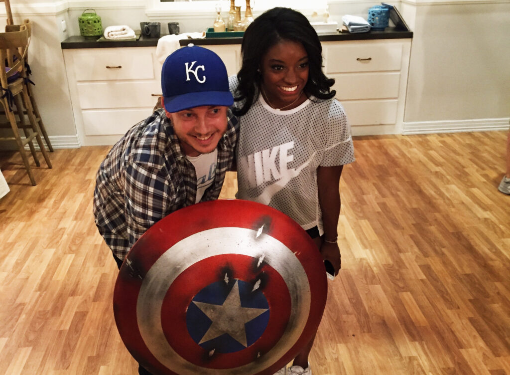 Joshua Potter with Simone Biles.