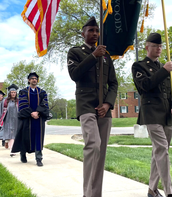 The line of graduates of William Woods University proceeds to the Cutlip Auditorium.