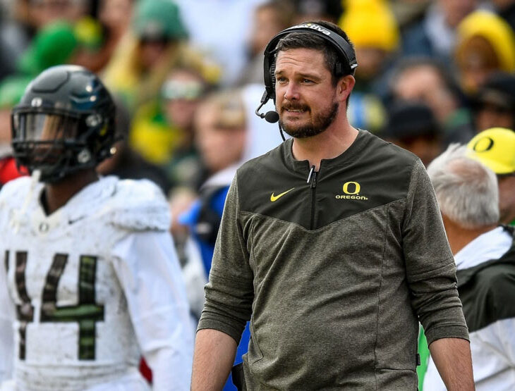 Coach Dan Lanning on the sidelines of Oregon football game.