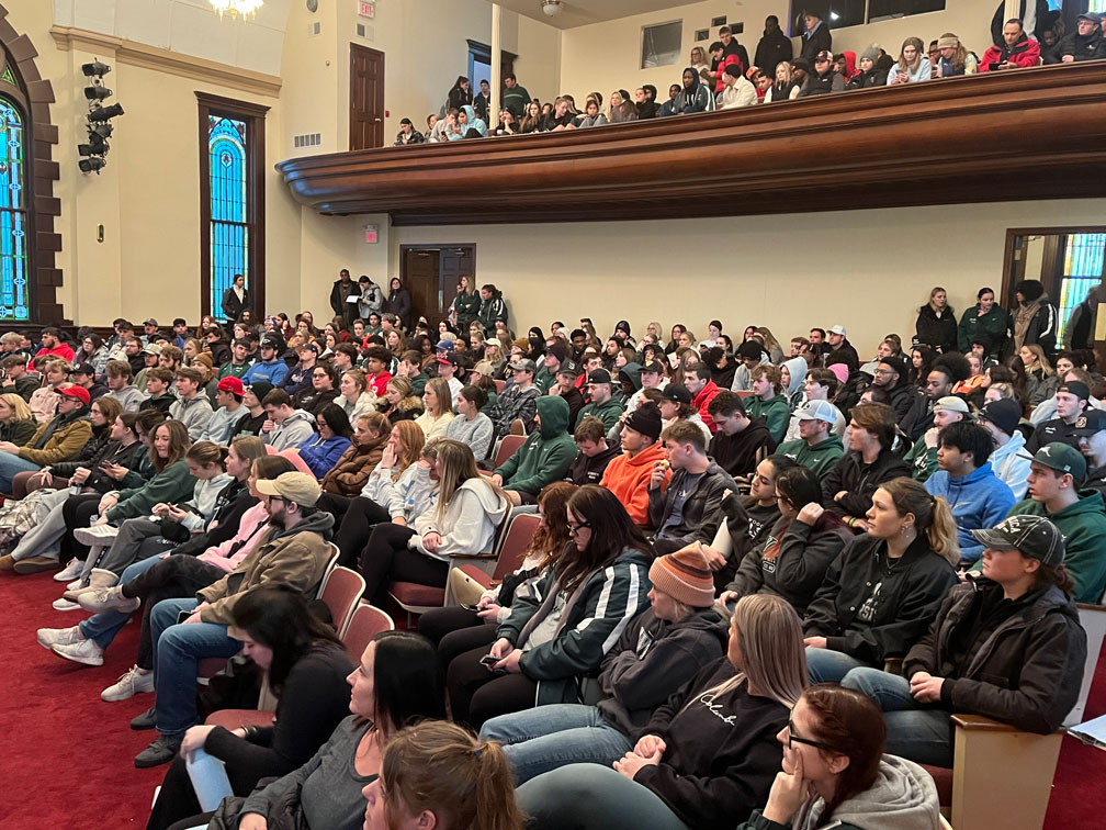 Rick Horton speaking to a packed house on William Woods University Campus