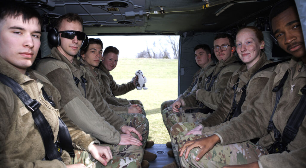 Show-Me GOLD students sitting in the black hawk helicopter